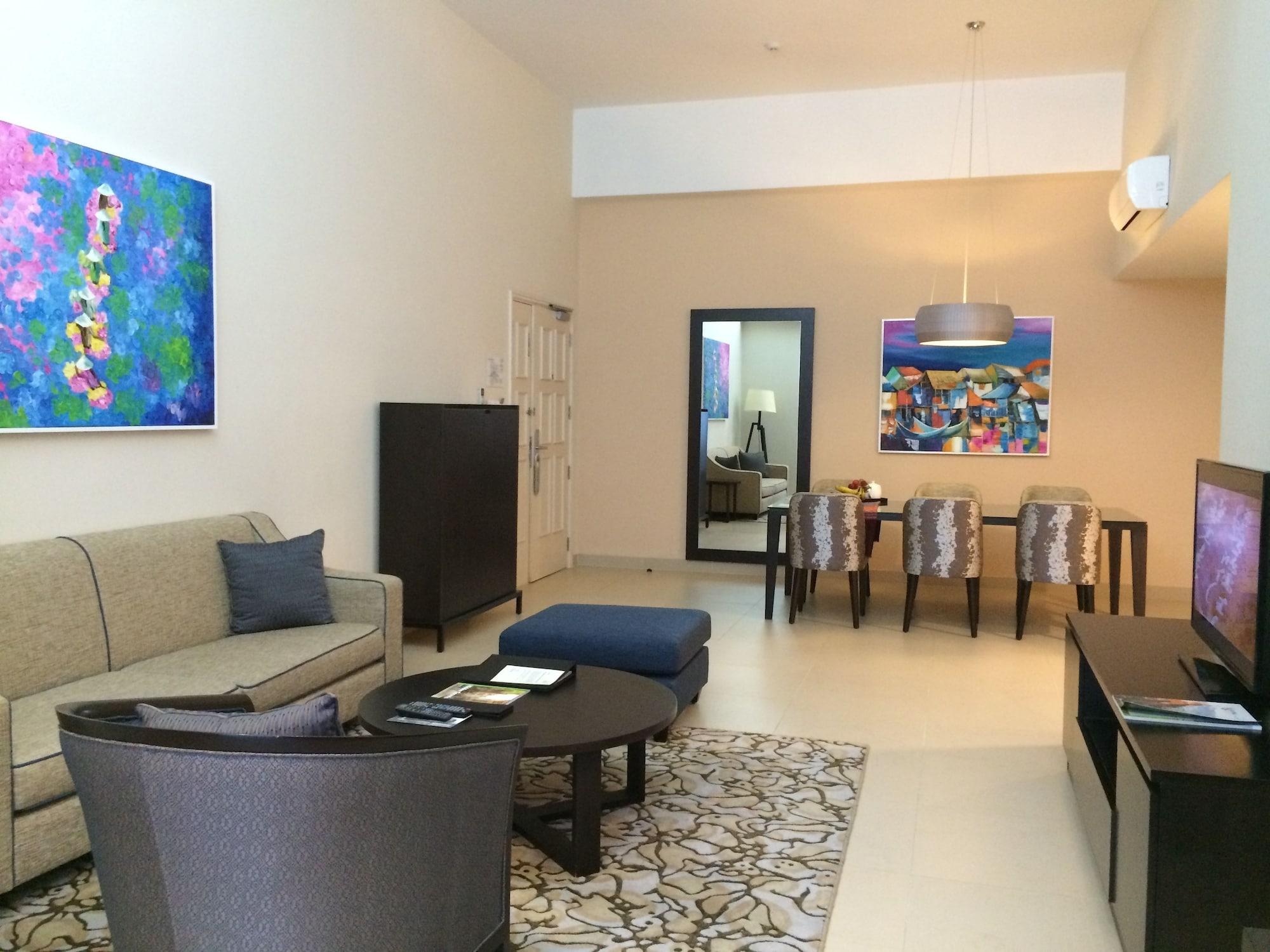 Somerset Хошимин Екстериор снимка A living room in a typical apartment at the Ritz-Carlton, DIFC